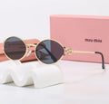 Miu Miu Oval Gold