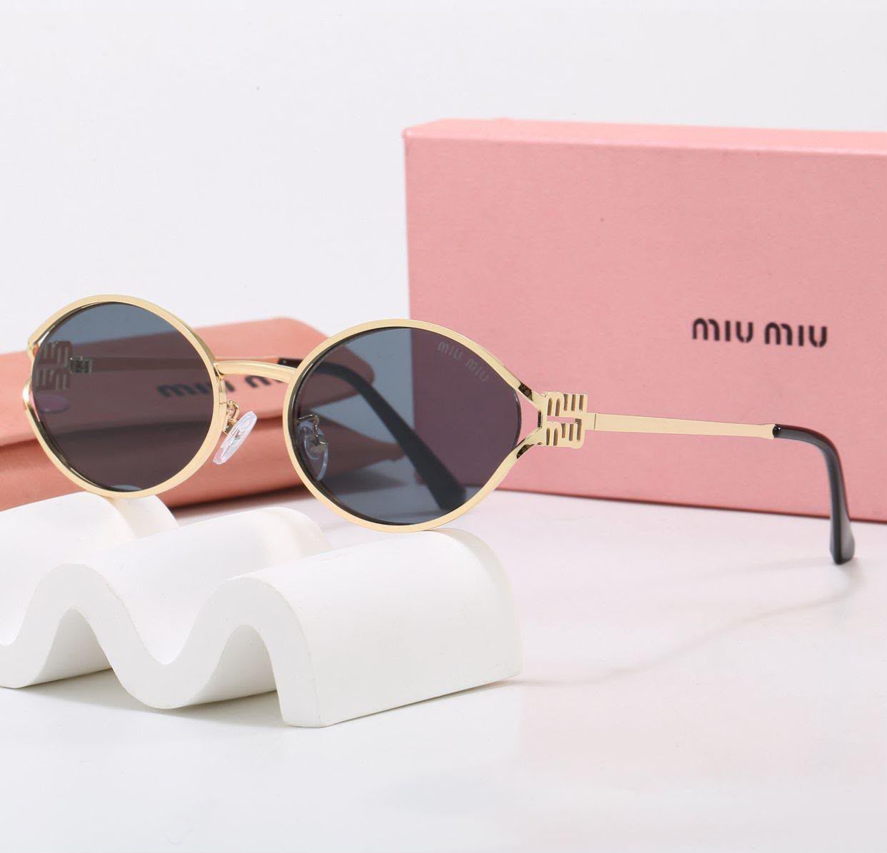 Miu Miu Oval Gold